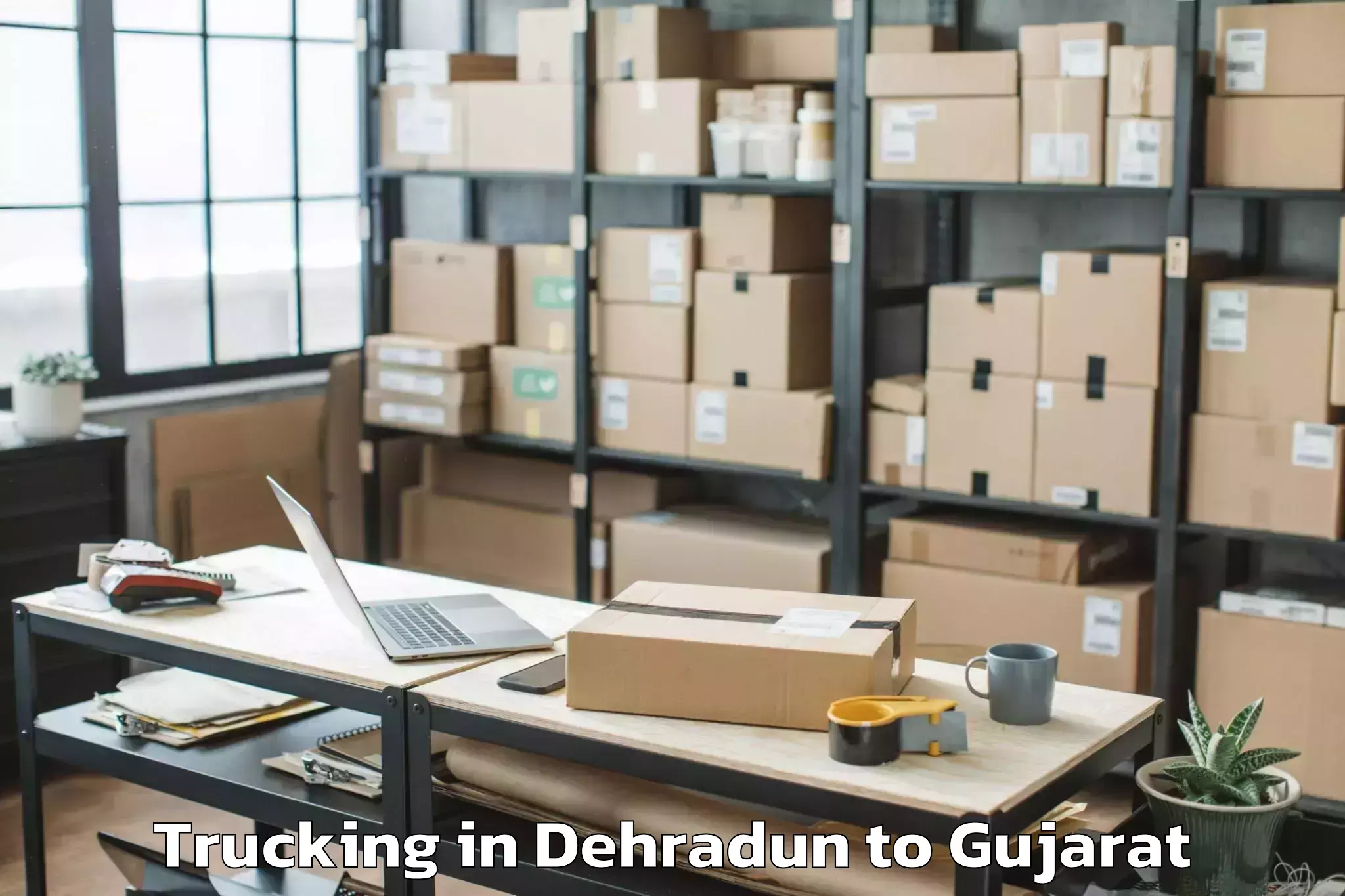 Top Dehradun to Vadgam Trucking Available